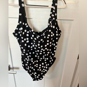 Bathing suit, size large, excellent condition. Black with white polkadots.